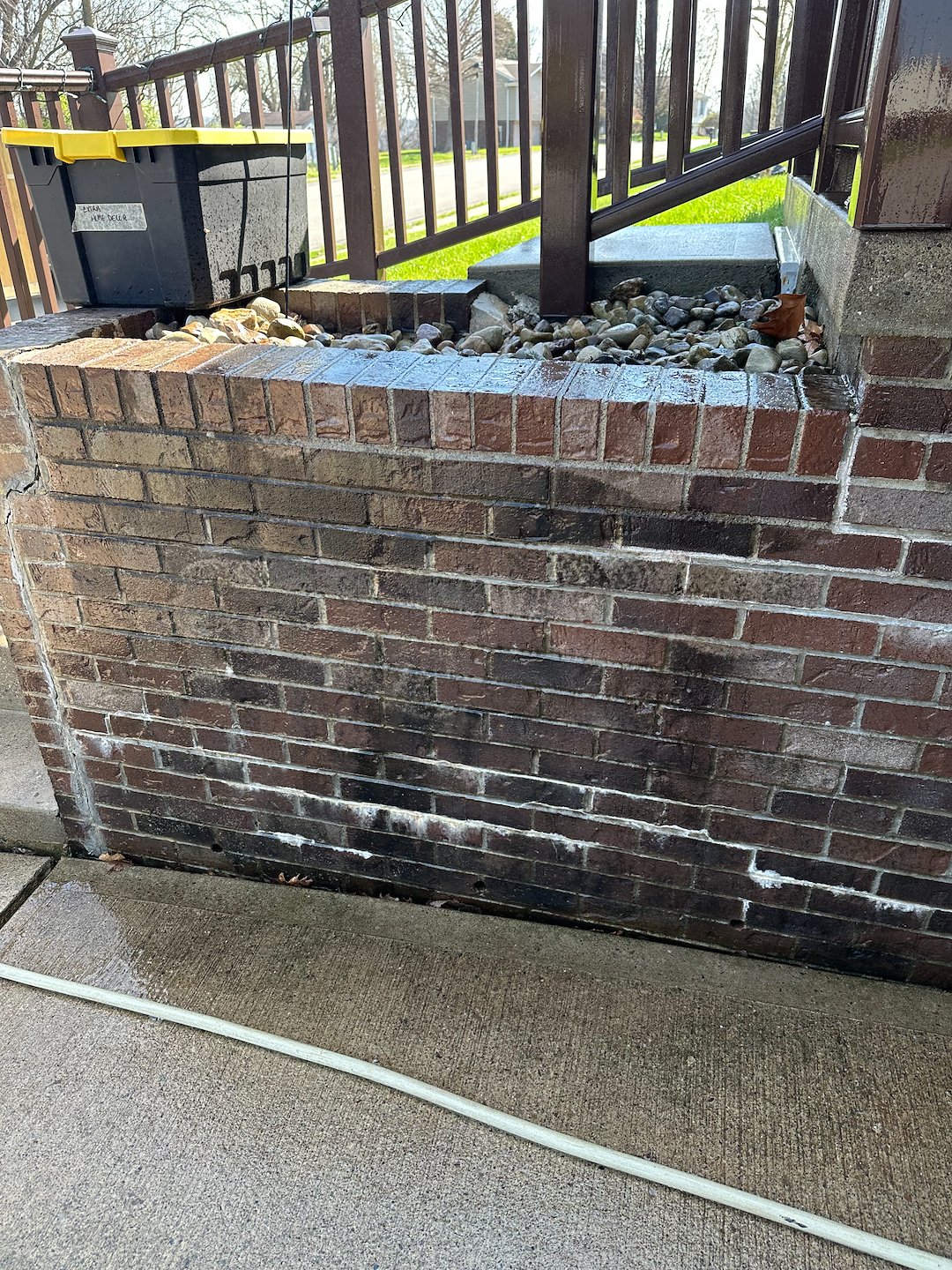 Years of Dirt and Algae Washed off of Brick